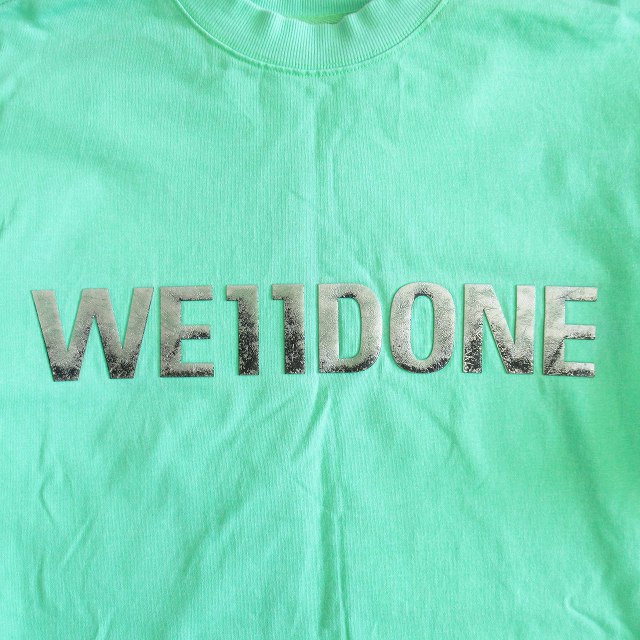 【関税込み】We11done カーキ Sparkle ロゴ Tシャツ 関税込み】We11done カーキ Pierced Tシャツ (We11Done/Tシャツ