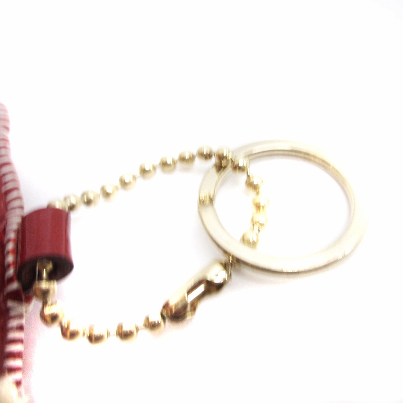 GUCCI グッチ グッチョリ アルトゥ ダックスフント キーホルダ キーリング Dog-shaped bag charm in beige and dark brown canvas | GUCCI® US