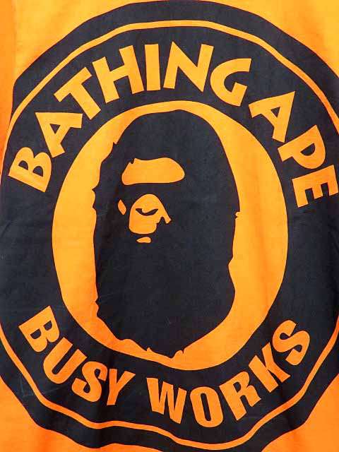 アベイシングエイプ A Bathing Ape Big Busy Works Tee ビッグ サル顔 プリント Tシャツ S サイズ オレンジ ブランド古着ベクトル 中古 0611 メンズ 037 ベクトルパーク