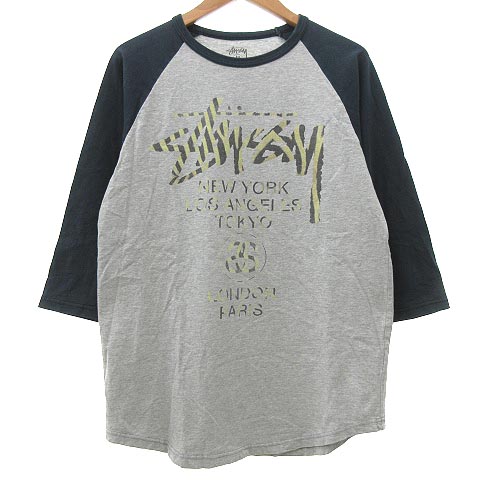 【STUSSY】古着 7分袖ロンT ラグラン ビックプリントロゴ ワールドツアー STUSSY】古着 7分袖ロンT ラグラン ビックプリントロゴ ワールド
