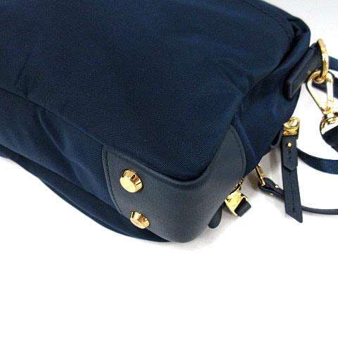 トゥミ TUMI バッグ ショルダー ポシェット 紺 ゴールド /NT11