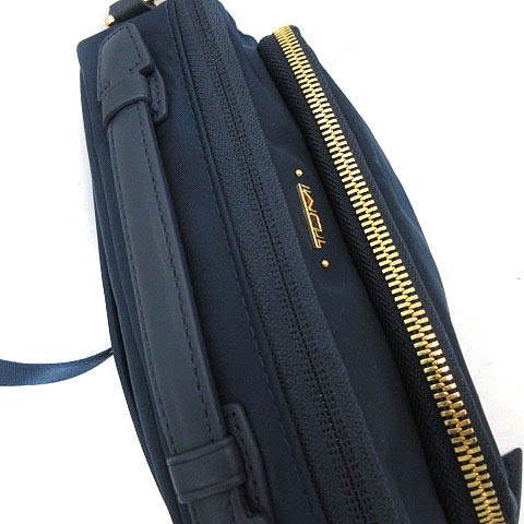 TUMI  レディースバッグ　紺 トゥミ TUMI バッグ ショルダー ポシェット 紺 ゴールド /NT11