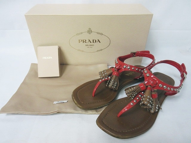 プラダ PRADA サンダル スタッズ タッセル ストラップ レザー フラット 