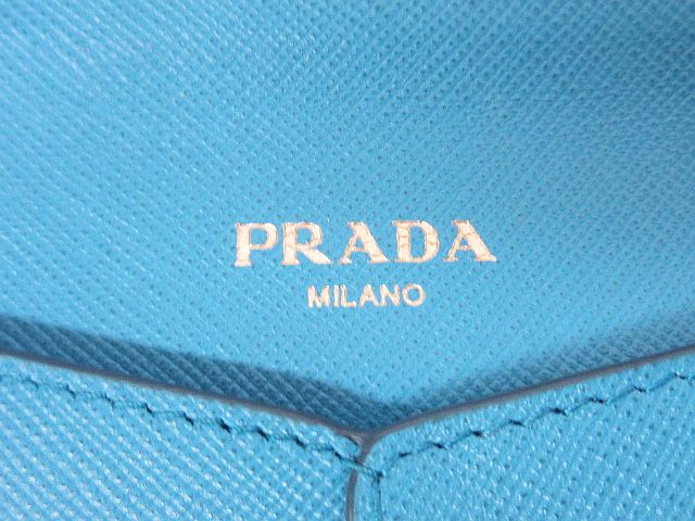 ✨未使用展示品・箱保証書付き✨　PRADA 長財布　ドキュメントケース　アイコン ✨新品未使用・箱保証書付き✨ PRADA 長財布 フラワー 花 刺繍