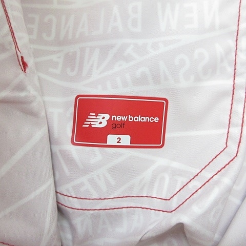 New Balance ロゴプリント スカート　　　Ｌ 超美品ニューバランスゴルフ スカート 白×黒 メッシュ地 ロゴ総柄