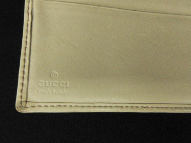 グッチ GUCCI インターロッキングG 財布 二つ折り レザー 白