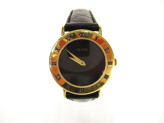 グッチ GUCCI 3000.2.L 腕時計 クォーツ 2針 黒文字盤 金色