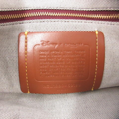 コーチ COACH ダンボコラボ シグネチャー クラッチバッグ Disney  