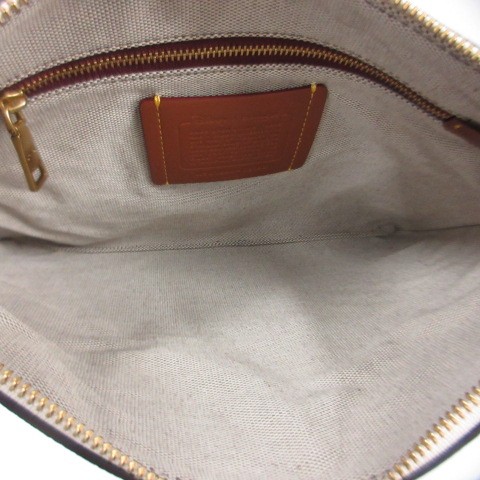 コーチ COACH ダンボコラボ シグネチャー クラッチバッグ Disney  